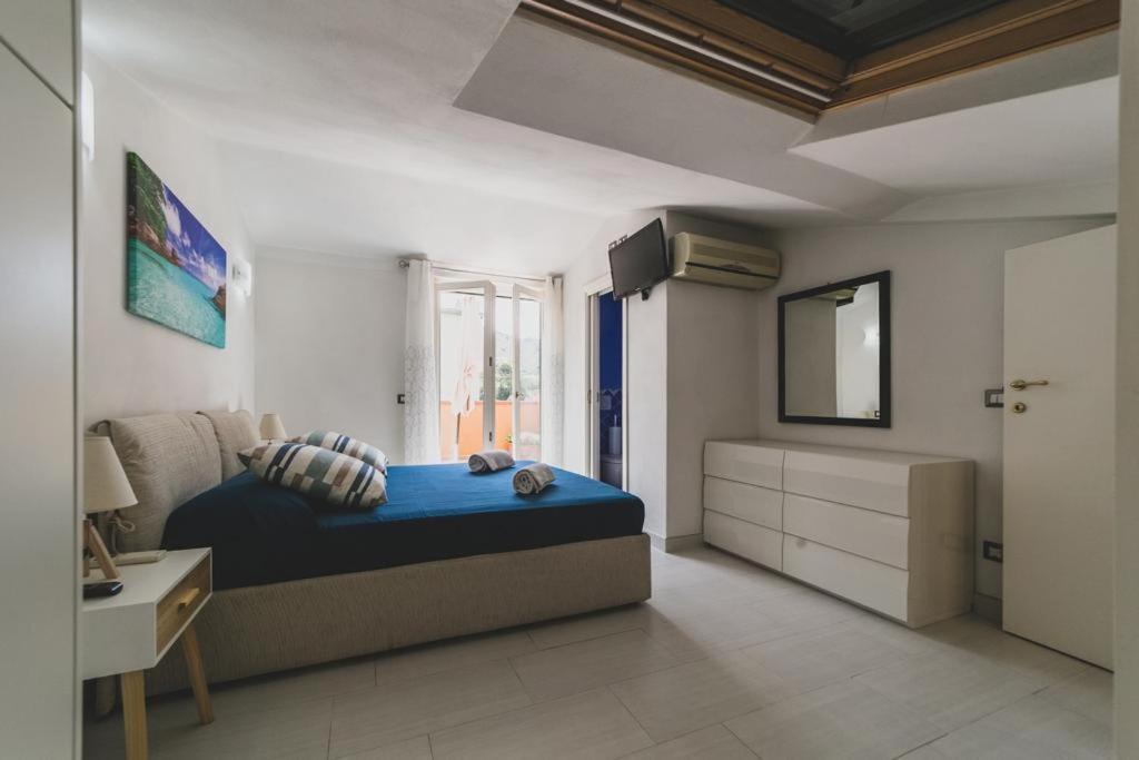 Molly Apartment Порто Санто Стефано Экстерьер фото